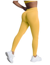 Yellow leggings worn by a person on a light gray background