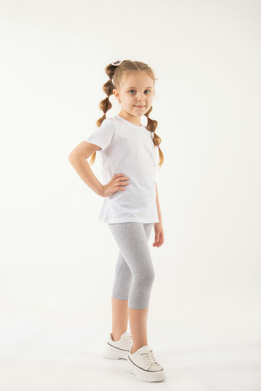 a little girl is posing for a picture