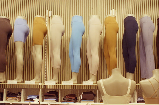 Mannequins display colorful leggings and athletic wear.